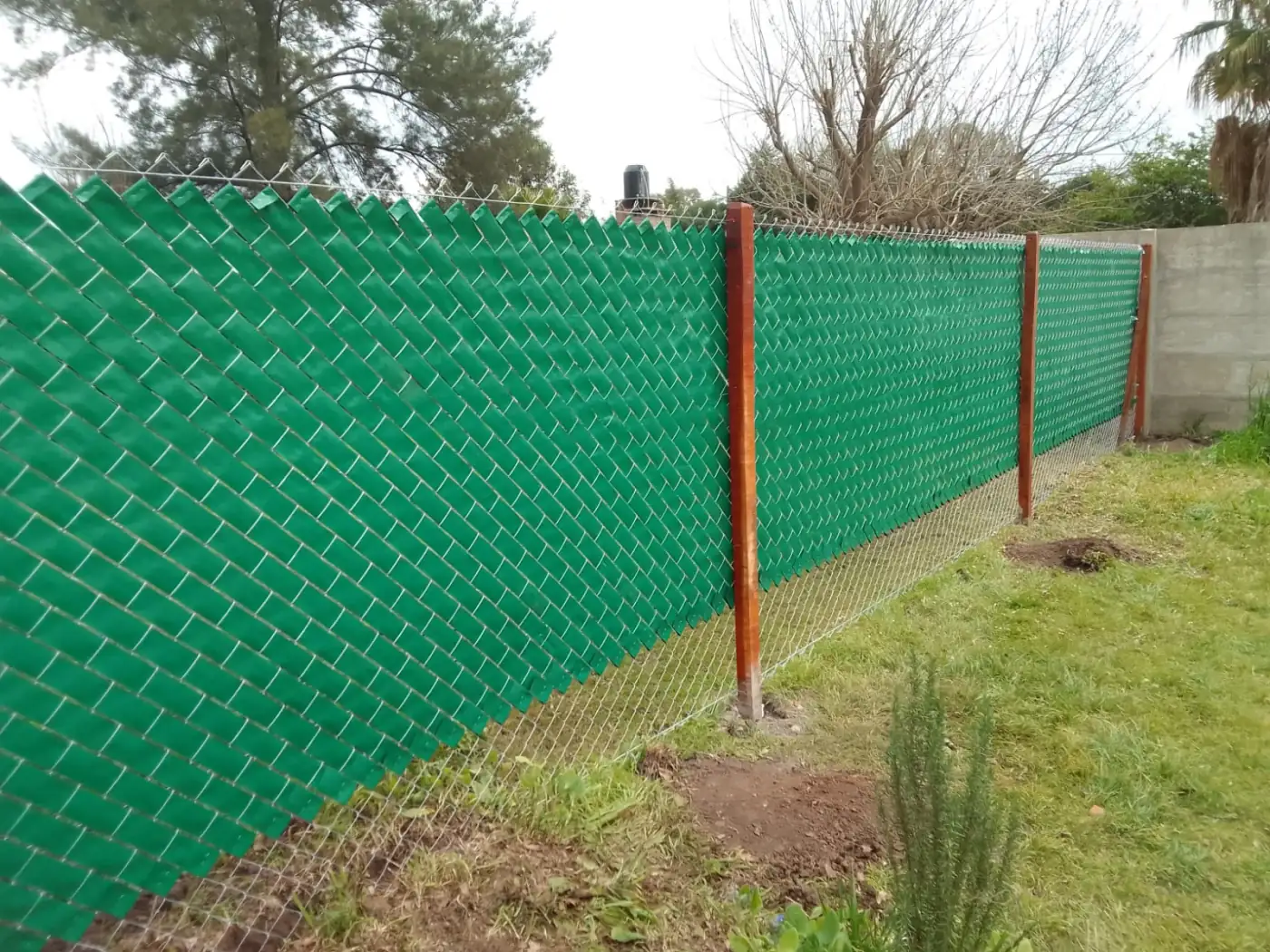 Cerco olimpico con listones de PVC verde para privacidad en Rosario